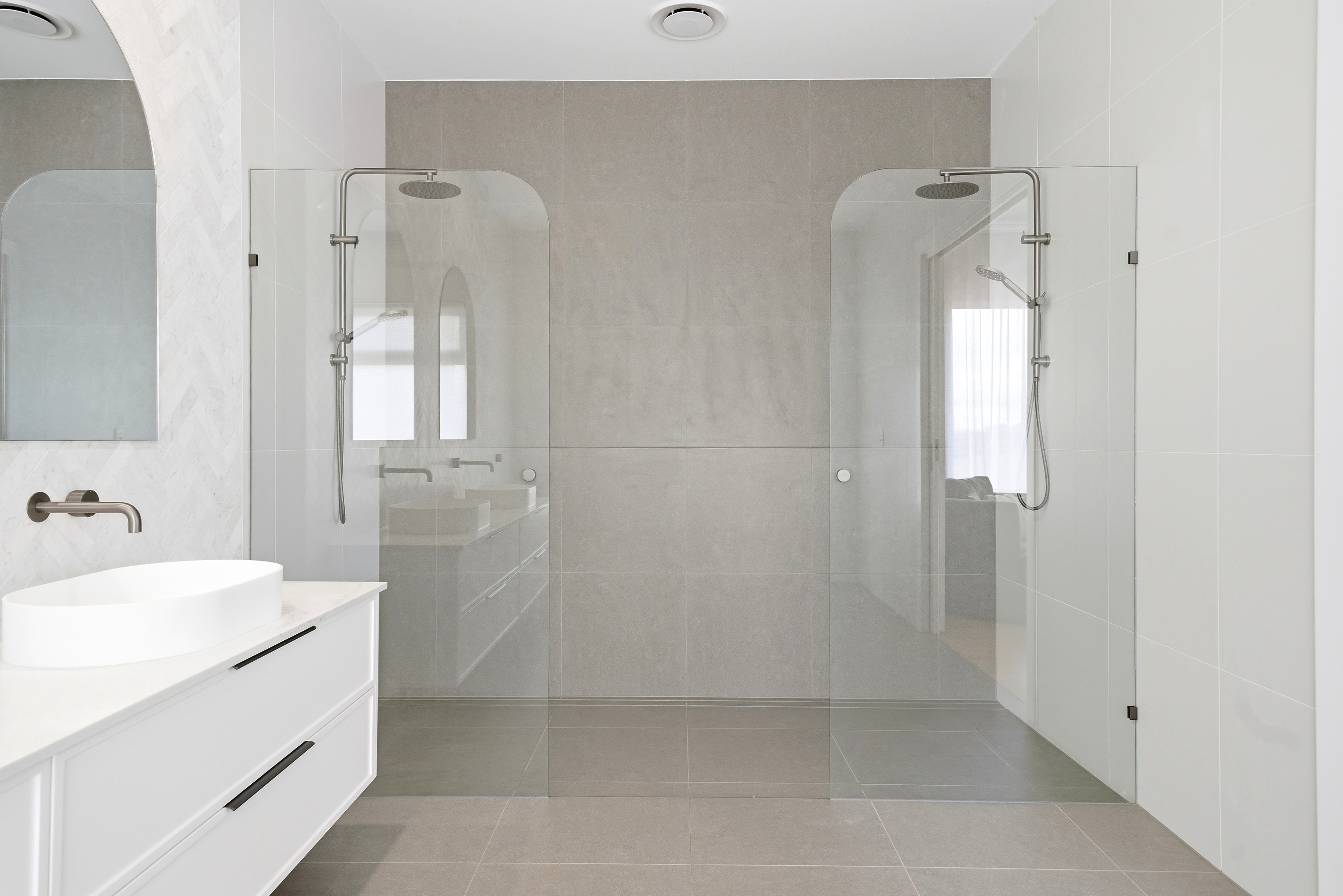 His-and-hers shower with feature stone